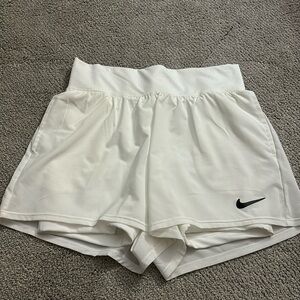 White Nike dri fit shorts with spandex under size XS worn once